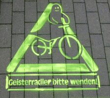 Piktogramm Geist auf Fahrrad
