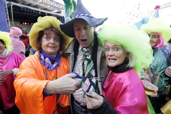 Costumed people celebrating Fastnacht.